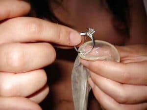 Hotwife throws wedding ring into an inseminated sperm condom.