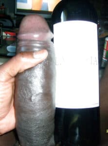 The dreamy BBC Cock from Clitorisbreaker next to a wine bottle
